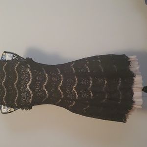 Black cocktail dress with nude underlining